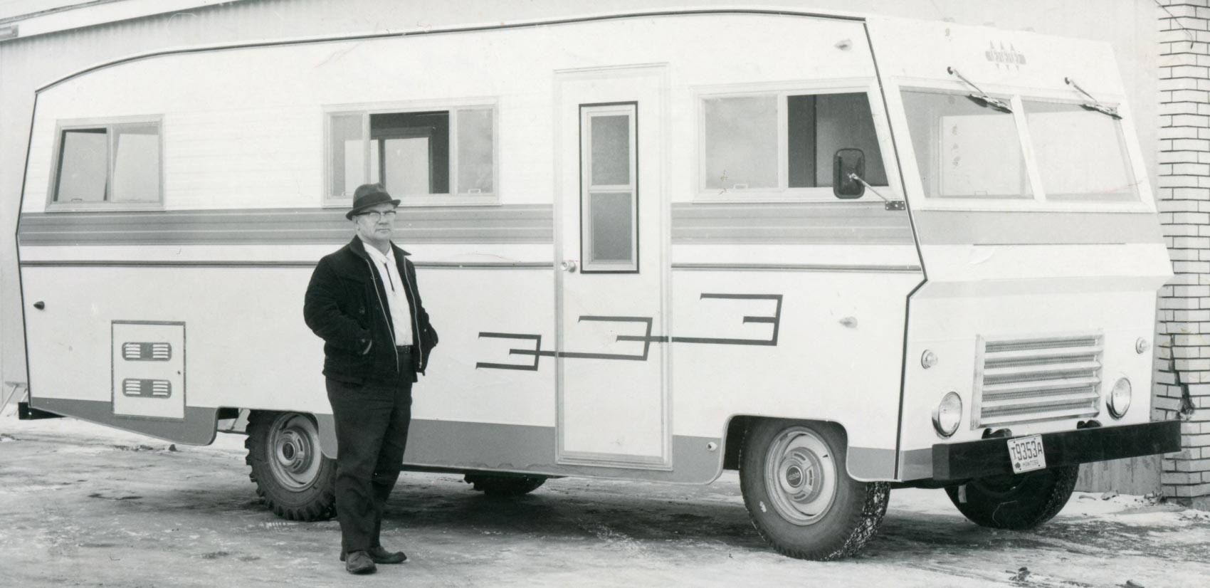 Triple E’s co-founder standing in front of an early RV