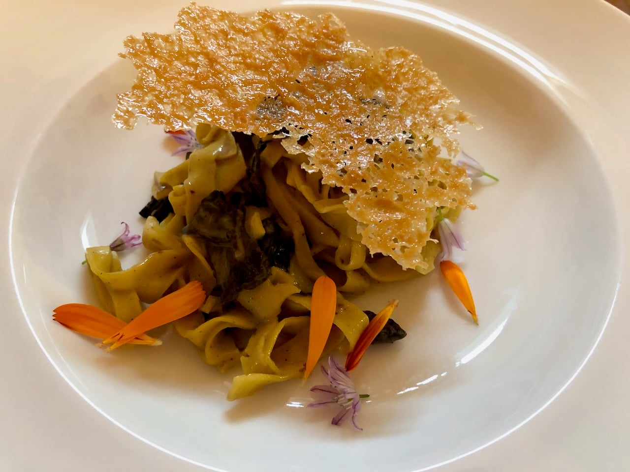 Hand cut Tagliatelle Pasta with Wild Black Mushrooms and a shaving of Glen Shepards Island Bready Cheese on top. The Orchard Kitchen, Langley, Washington.jpeg