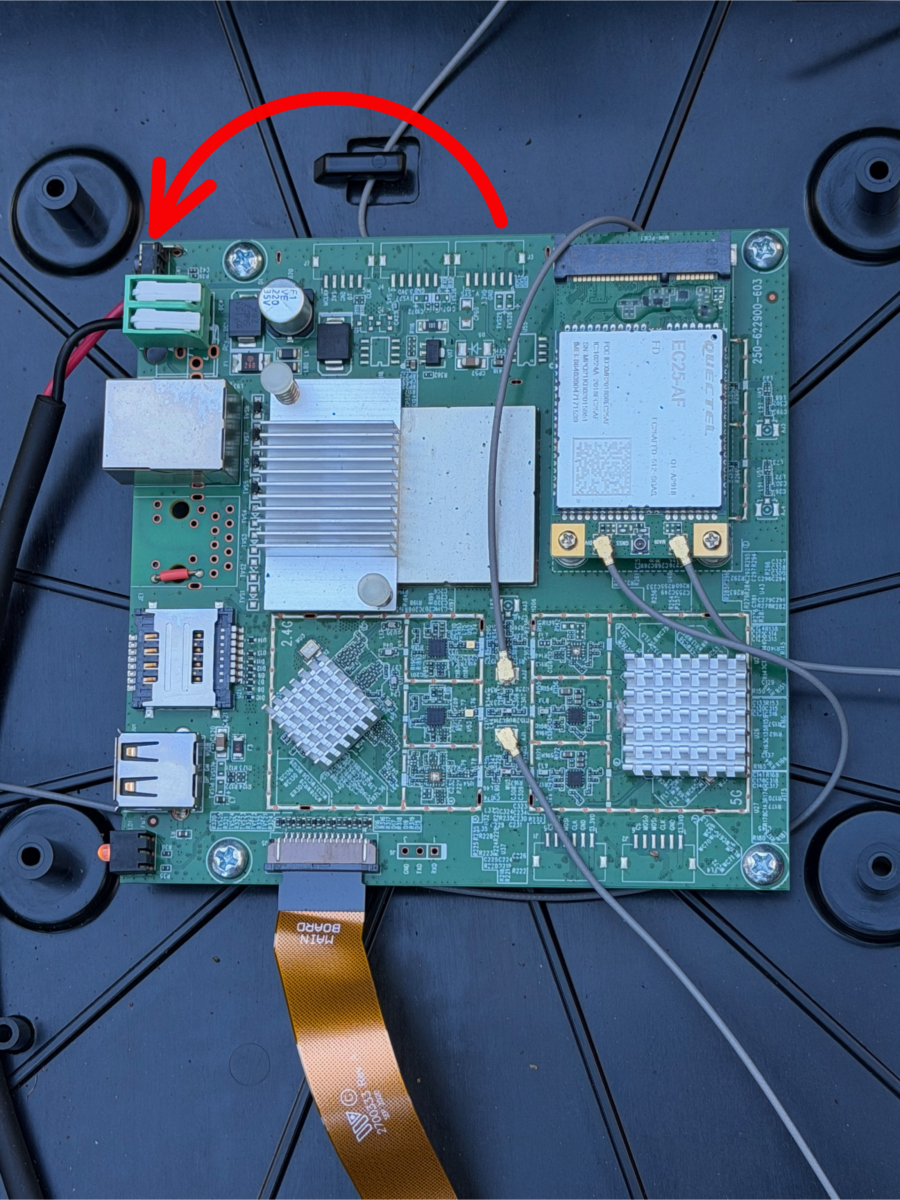 The reset button on the Winegard ConnecT 2.0+ motherboard