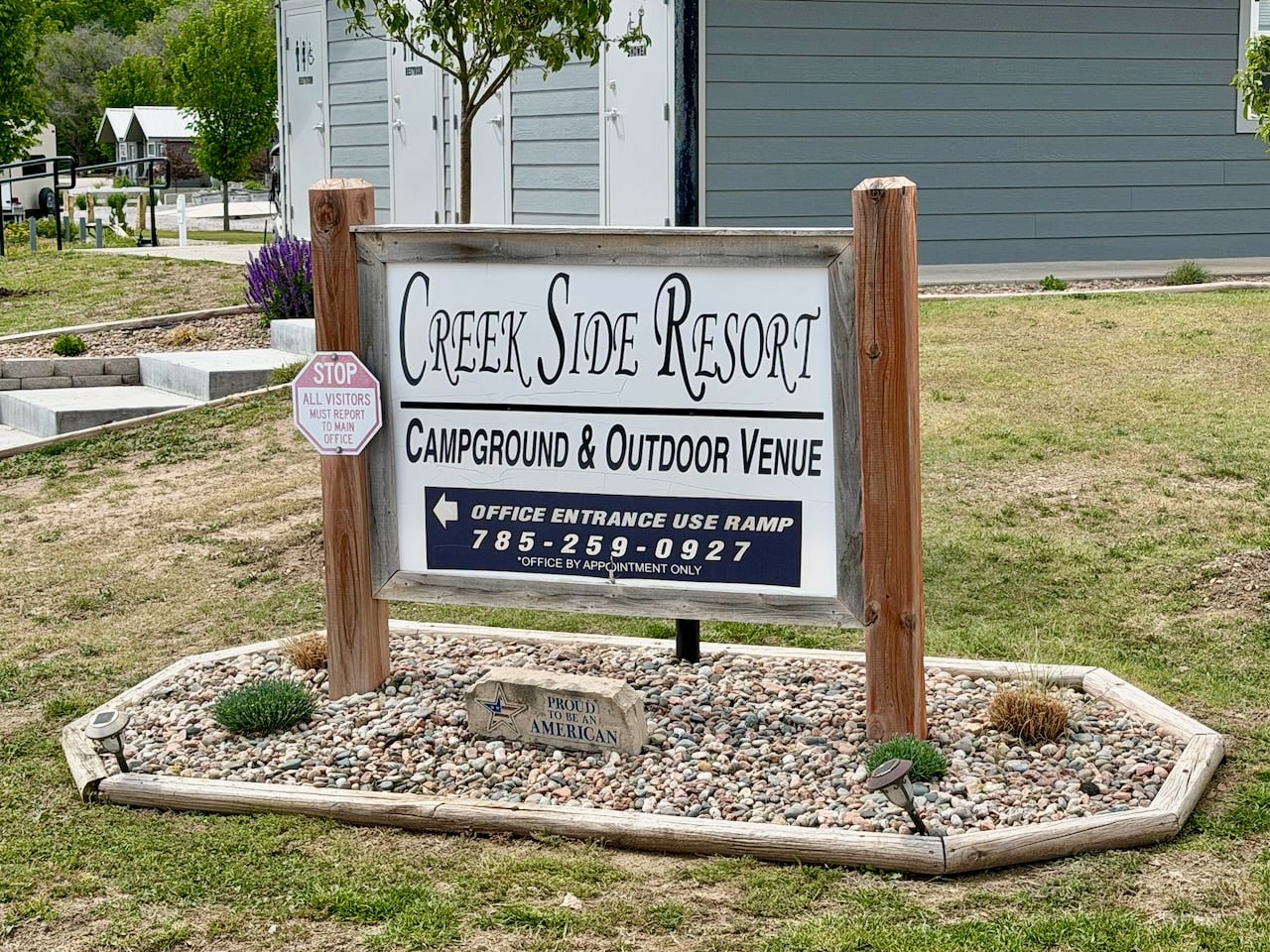 Creek side resort sign